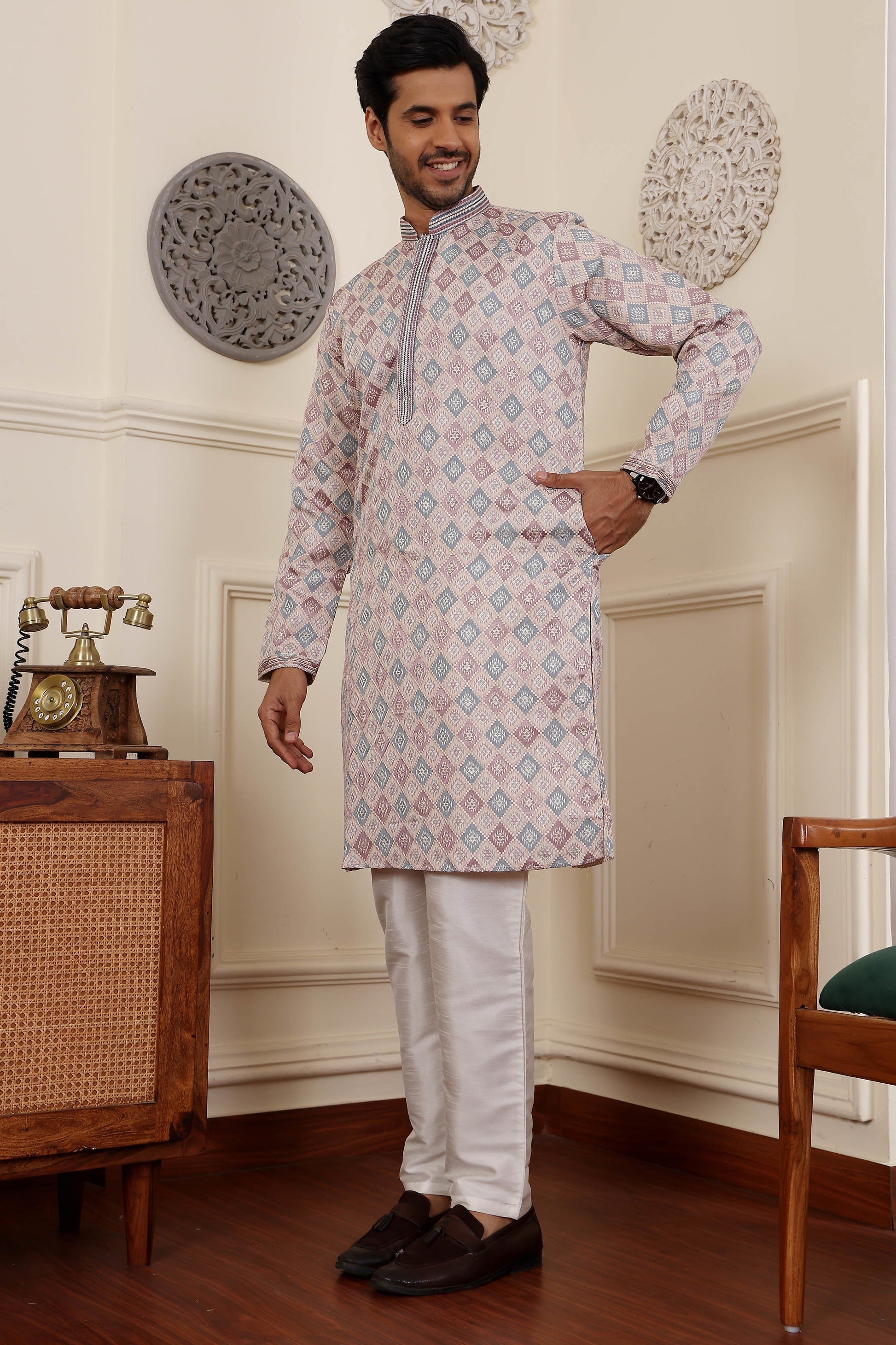 Light pink kurta for men showcasing subtle jacquard work