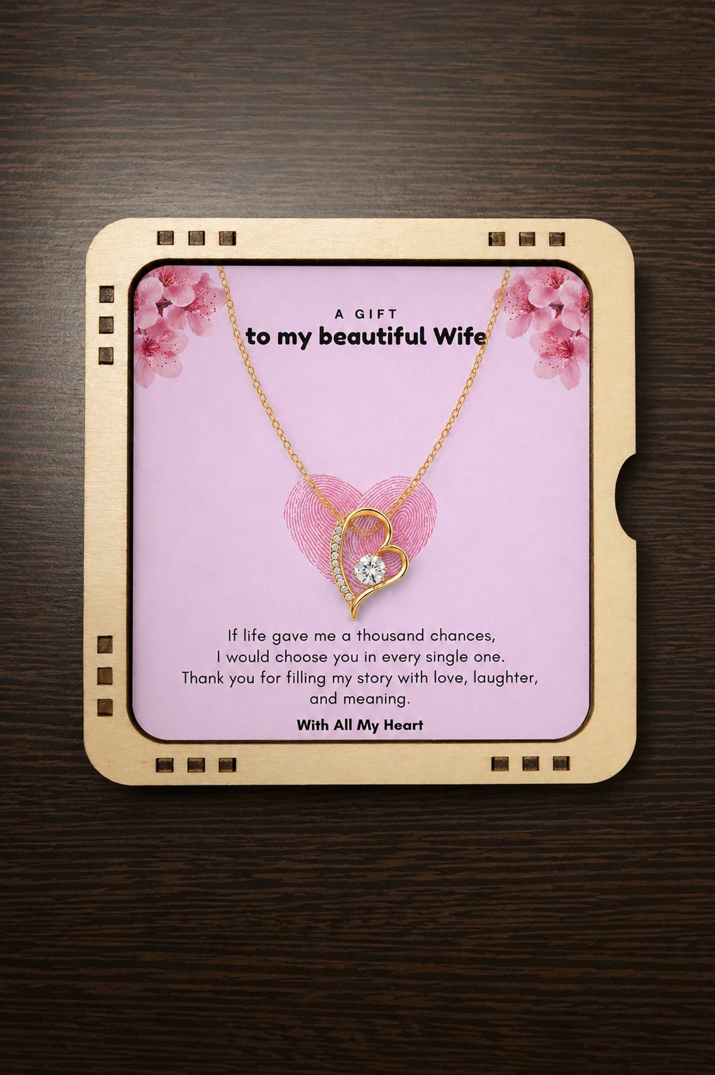 Elegant open-heart necklace with clear stone displayed on a floral gift card for wife.